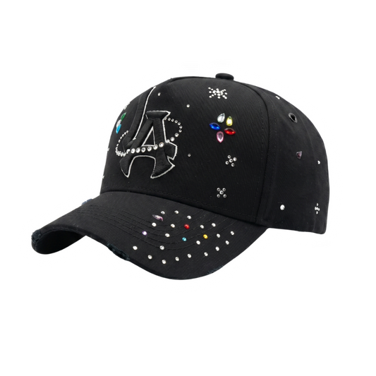 Gorra Mago Universe negra con bordado plateado, pedrería multicolor y detalles inspirados en el espacio